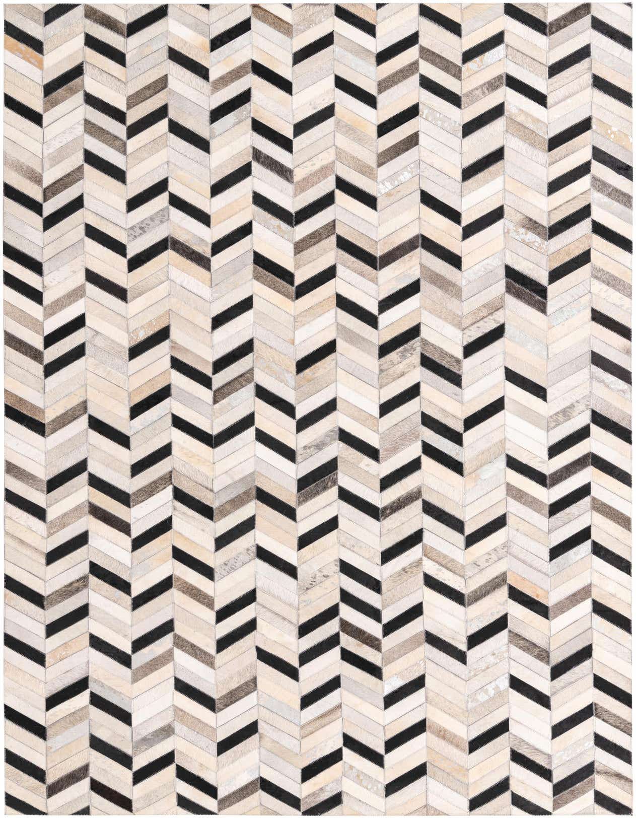 A 5x8 rectangular Cowhide rug featuring a modern chevron stripe pattern in multi-colored natural tones and black.