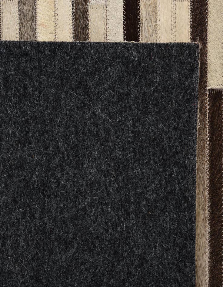 Detail image of  5' 4 x 7' 8 Cowhide Rug