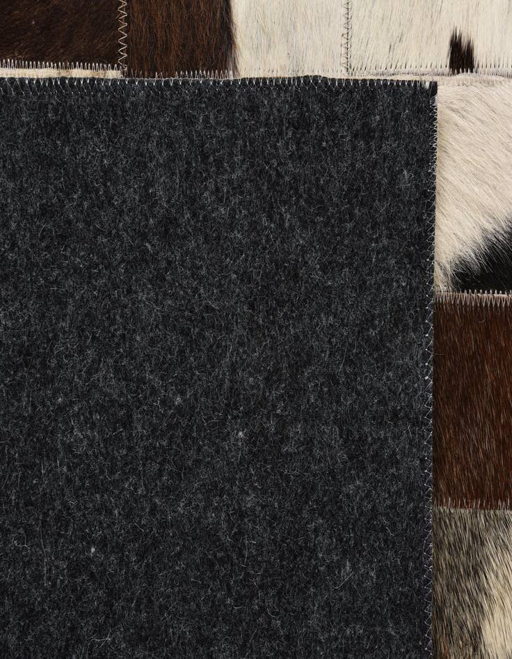 Detail image of  5' 2 x 7' 6 Cowhide Rug