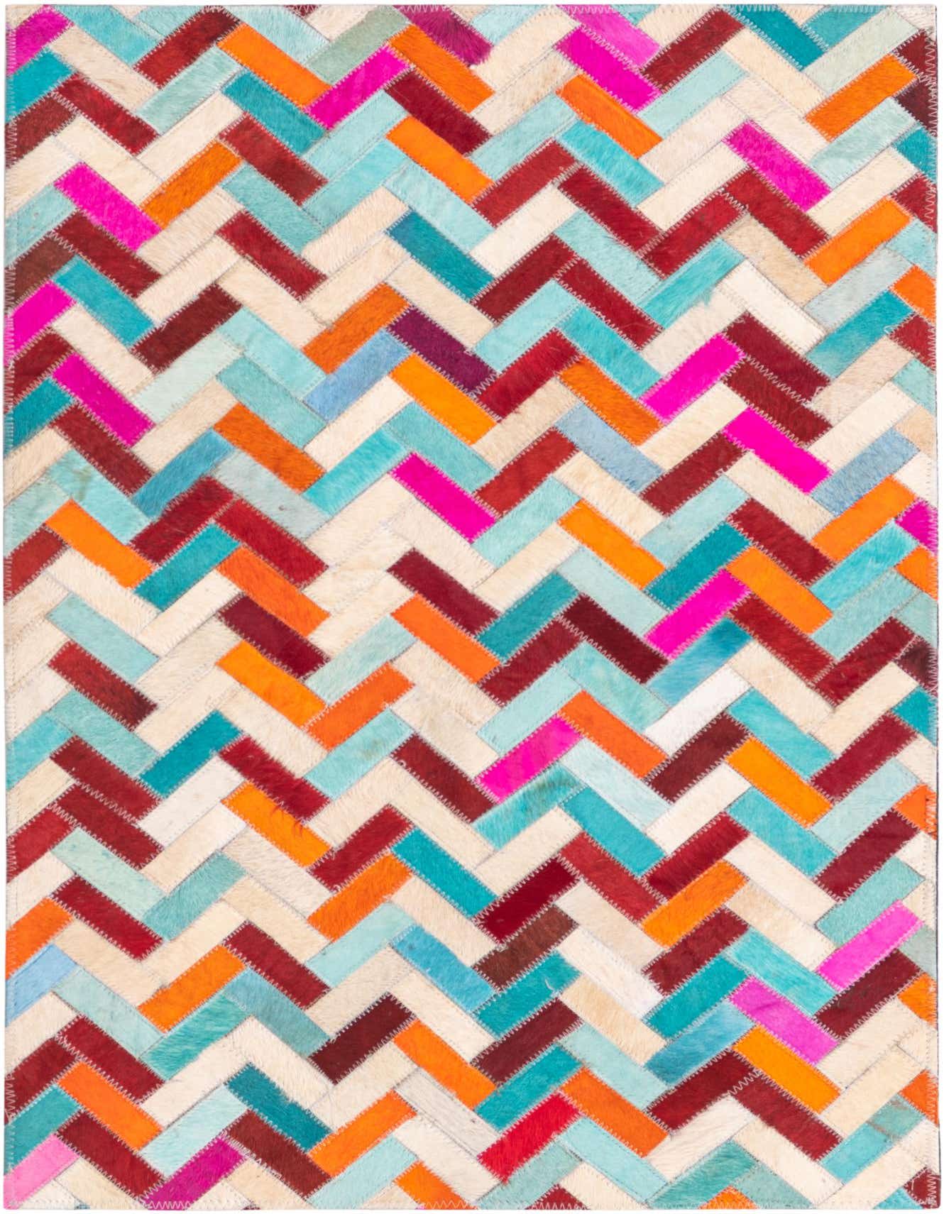 A 2x3 rectangular Cowhide rug with a modern multi-colored chevron pattern in vibrant hues of pink, orange, blue, and red.