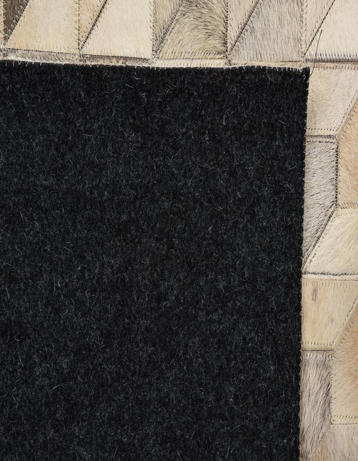 Detail image of  5' 4 x 7' 6 Cowhide Rug