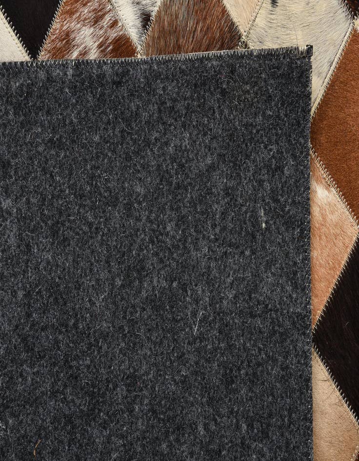 Detail image of  5' 5 x 7' 6 Cowhide Rug