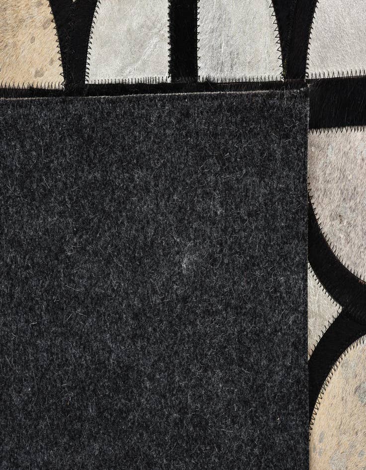 Detail image of  5' 3 x 7' 7 Cowhide Rug
