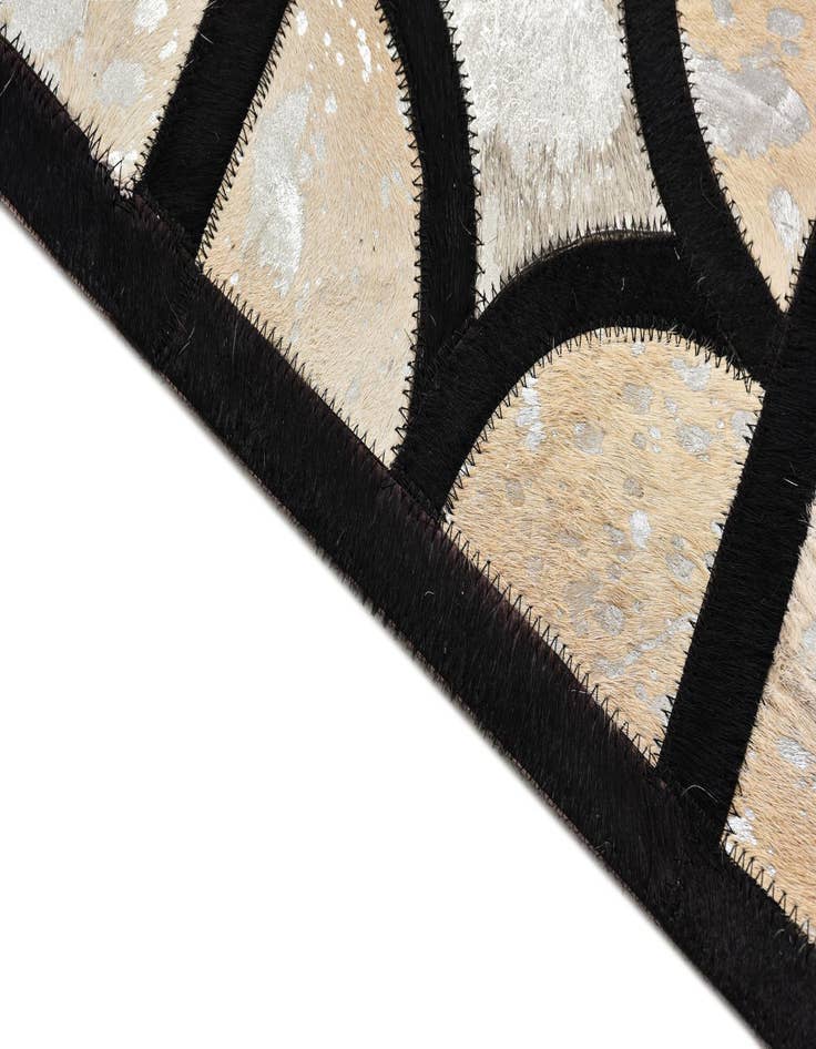 Detail image of  5' 3 x 7' 6 Cowhide Rug