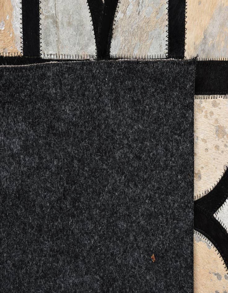 Detail image of  5' 3 x 7' 6 Cowhide Rug