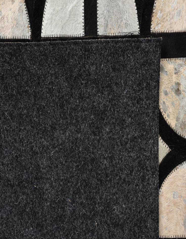 Detail image of  5' 3 x 7' 7 Cowhide Rug