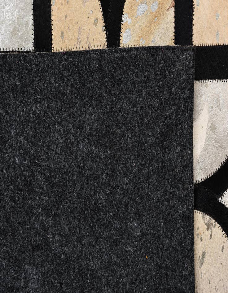 Detail image of  5' 3 x 7' 7 Cowhide Rug