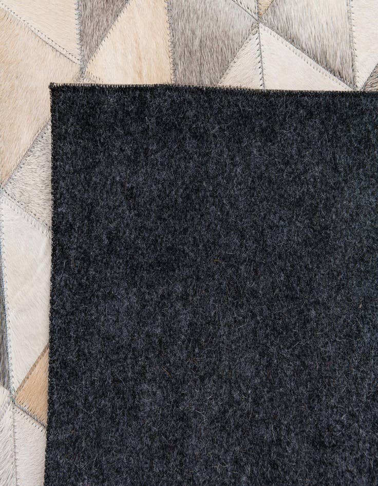 Detail image of  7' 11 x 10' Cowhide Stocks Rug