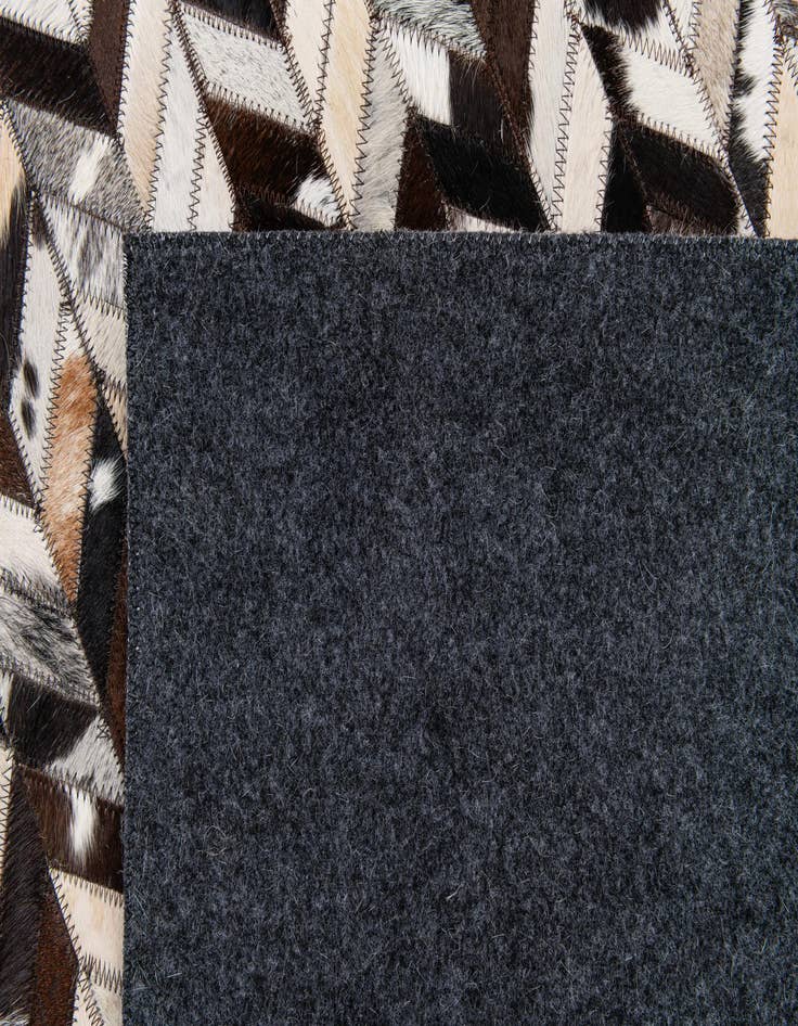 Detail image of  7' 7 x 9' 11 Cowhide Stocks Rug