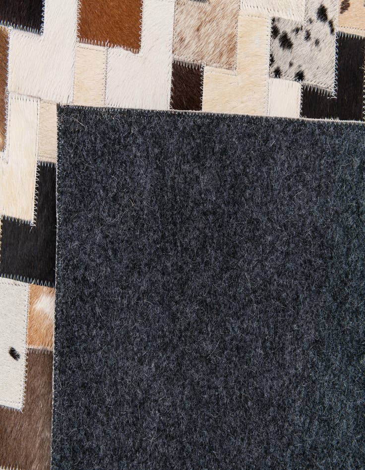 Detail image of  7' 11 x 9' 11 Cowhide Stocks Rug