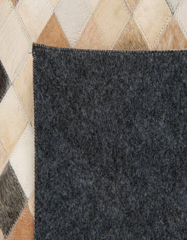 Detail image of  7' 11 x 9' 10 Cowhide Stocks Rug