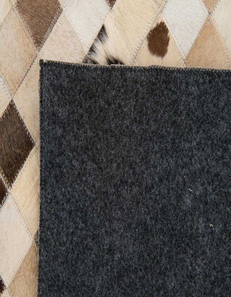 Detail image of  8' x 9' 11 Cowhide Stocks Rug