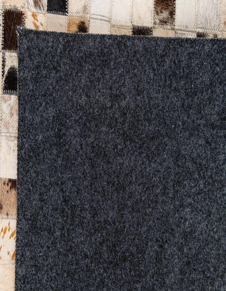 Detail image of  8' x 9' 11 Cowhide Stocks Rug