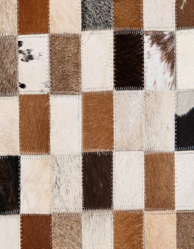 Detail image of  7' 11 x 9' 9 Cowhide Stocks Rug