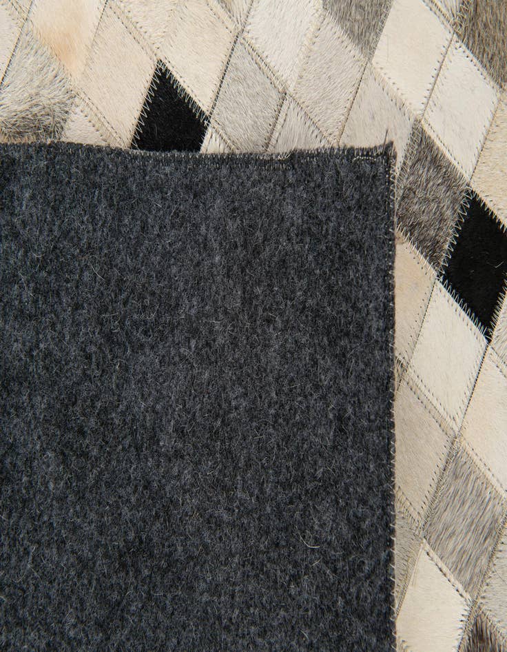 Detail image of  8' x 9' 11 Cowhide Stocks Rug