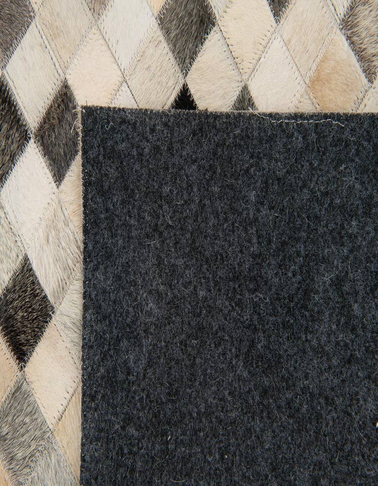 Detail image of  7' 11 x 9' 10 Cowhide Stocks Rug