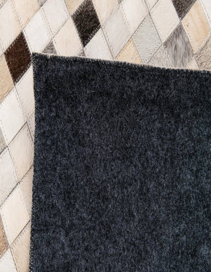 Detail image of  8' 1 x 9' 11 Cowhide Stocks Rug