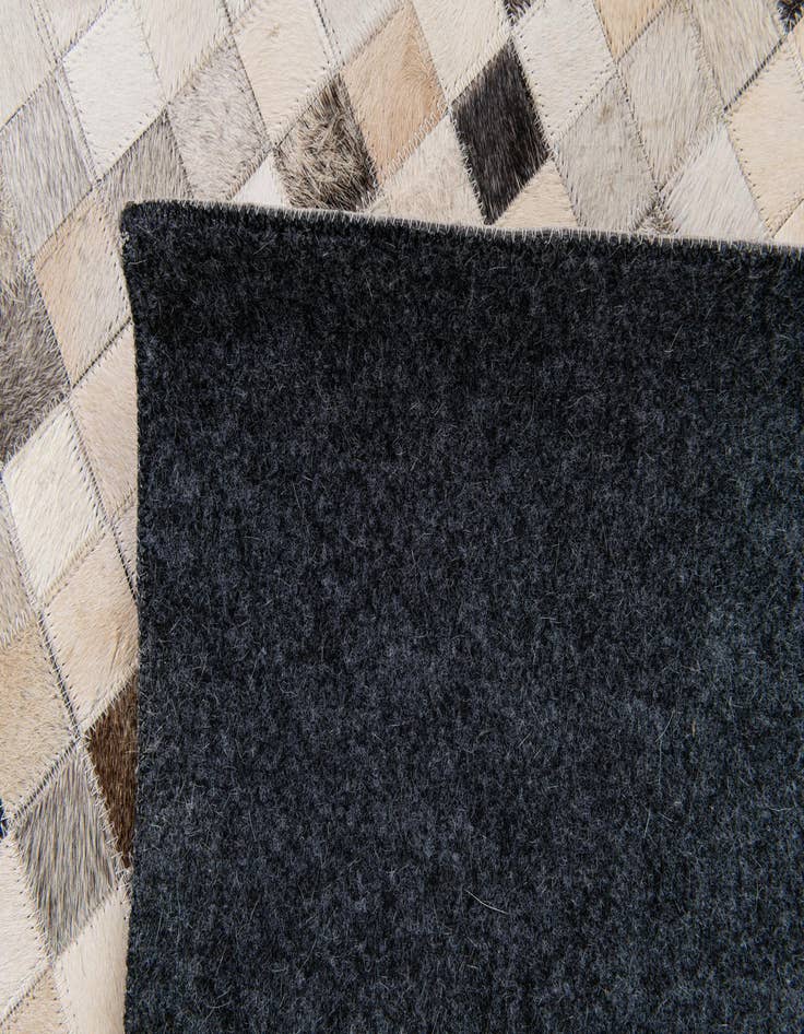 Detail image of  8' 1 x 9' 11 Cowhide Stocks Rug