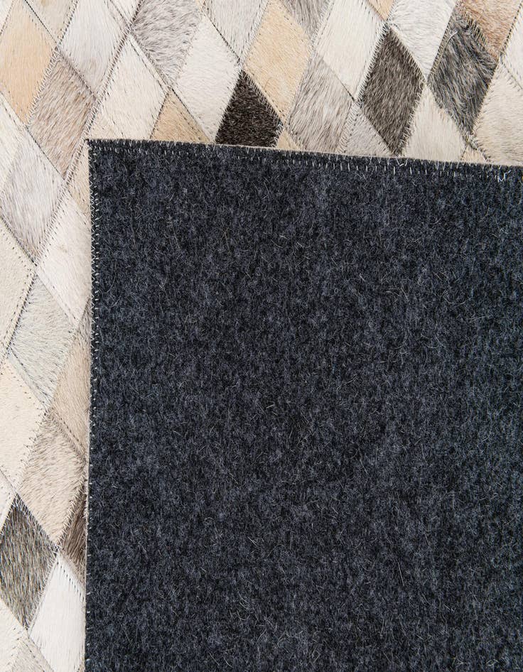 Detail image of  7' 11 x 9' 11 Cowhide Stocks Rug