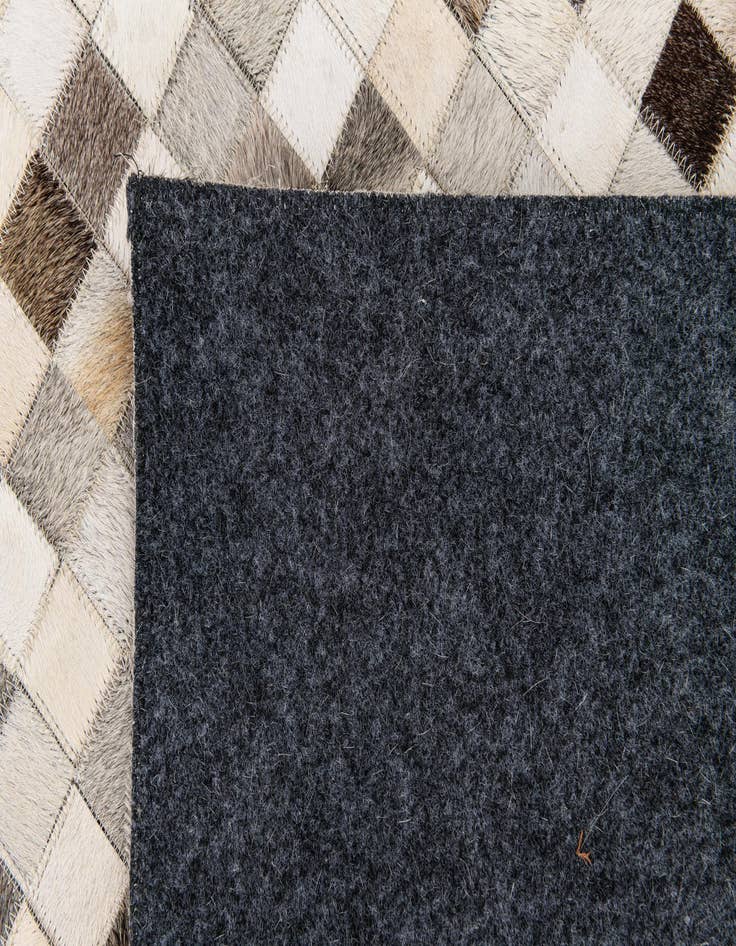 Detail image of  8' 1 x 9' 11 Cowhide Stocks Rug