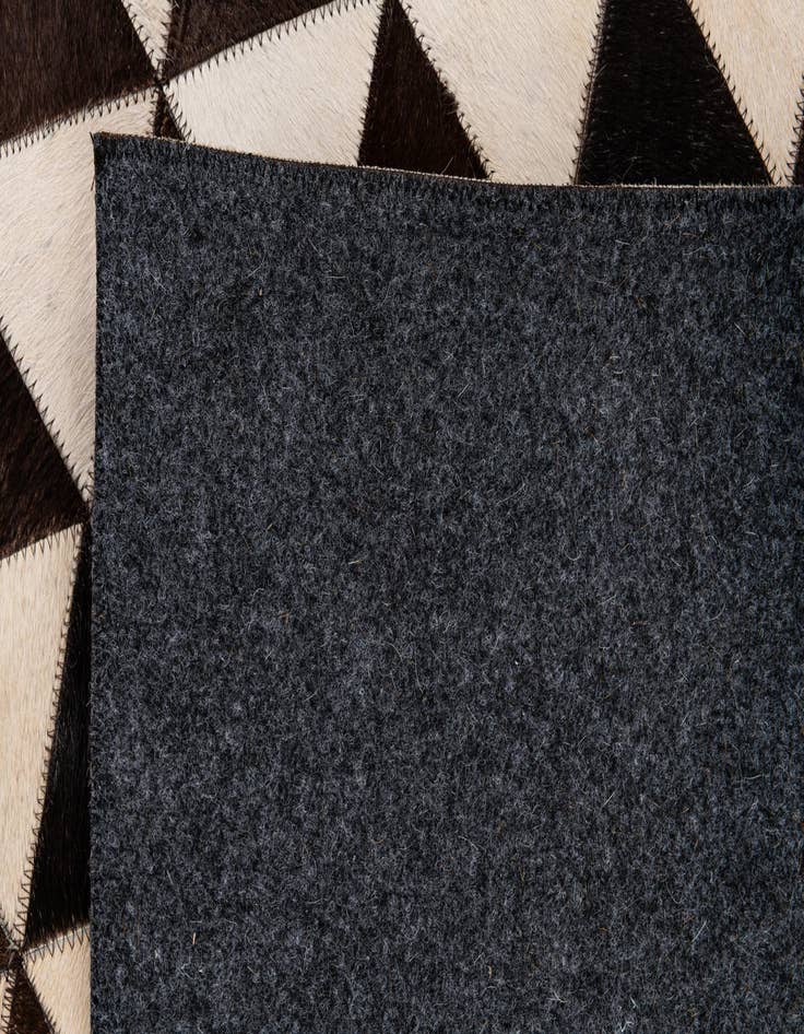 Detail image of  8' 1 x 10' Cowhide Stocks Rug
