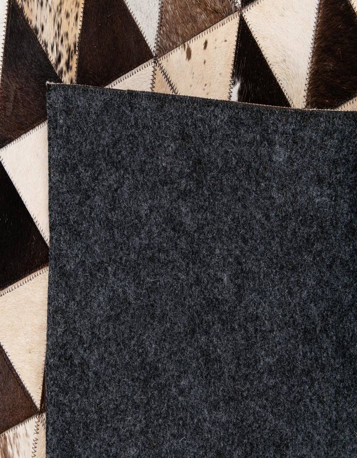 Detail image of  8' 1 x 10' 2 Cowhide Stocks Rug