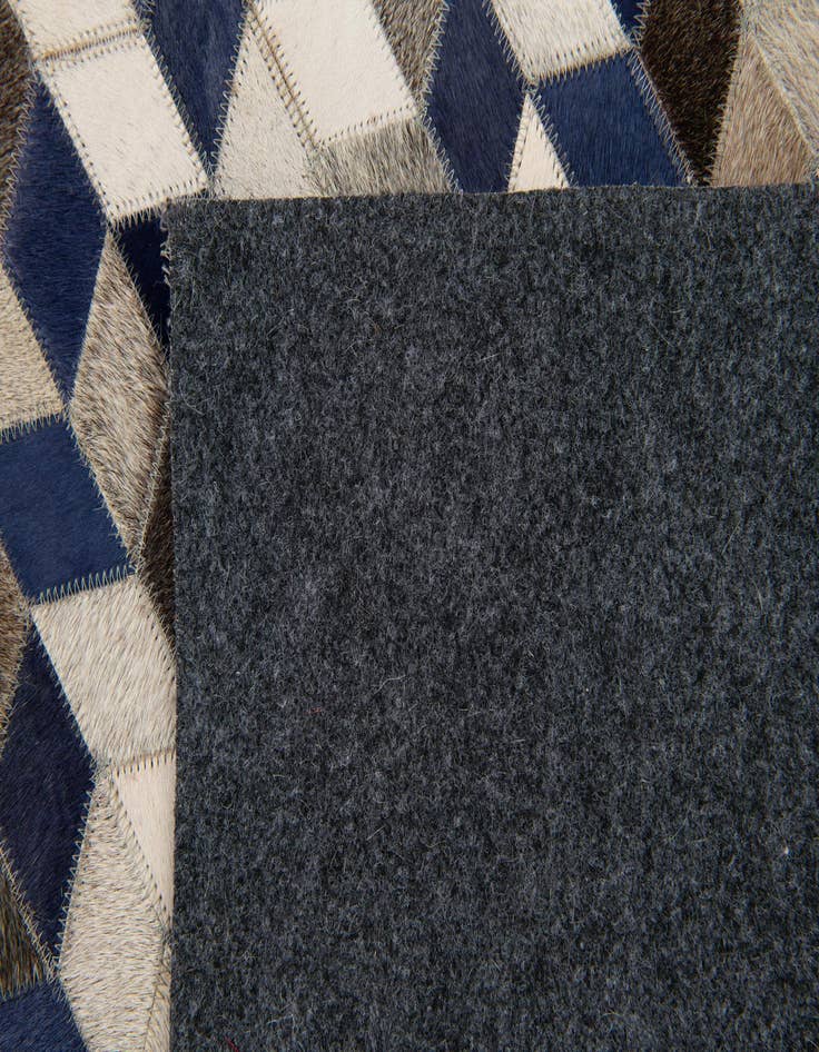 Detail image of  8' 2 x 9' Cowhide Stocks Rug