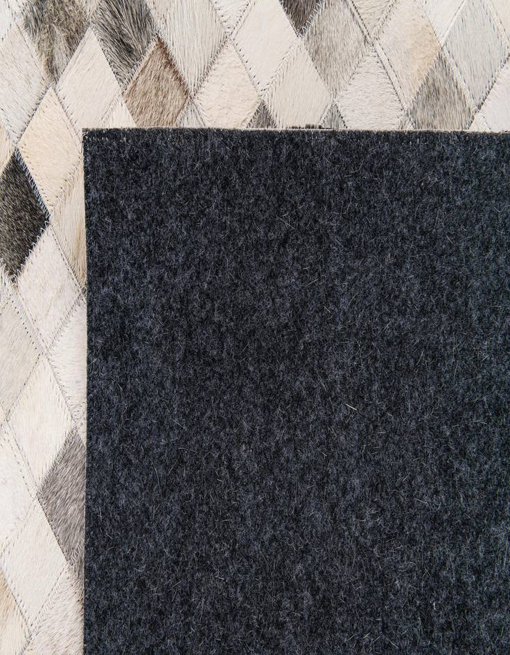 Detail image of  7' 11 x 9' 11 Cowhide Stocks Rug