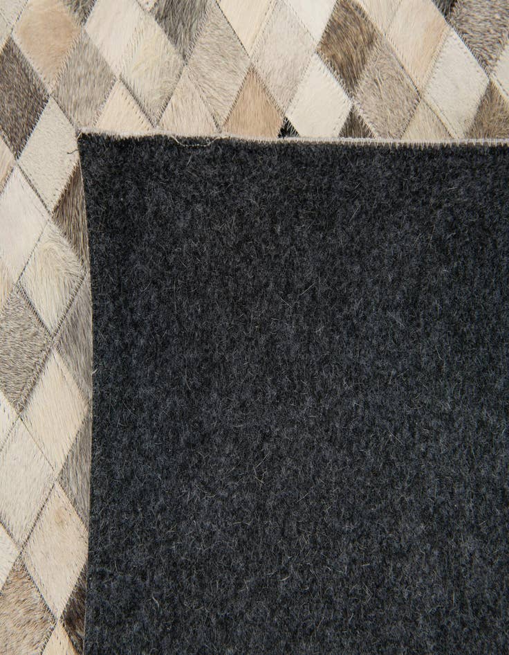 Detail image of  8' x 9' 9 Cowhide Stocks Rug