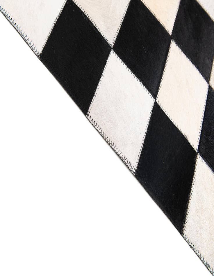 Detail image of  7' 11 x 9' 10 Cowhide Stocks Rug