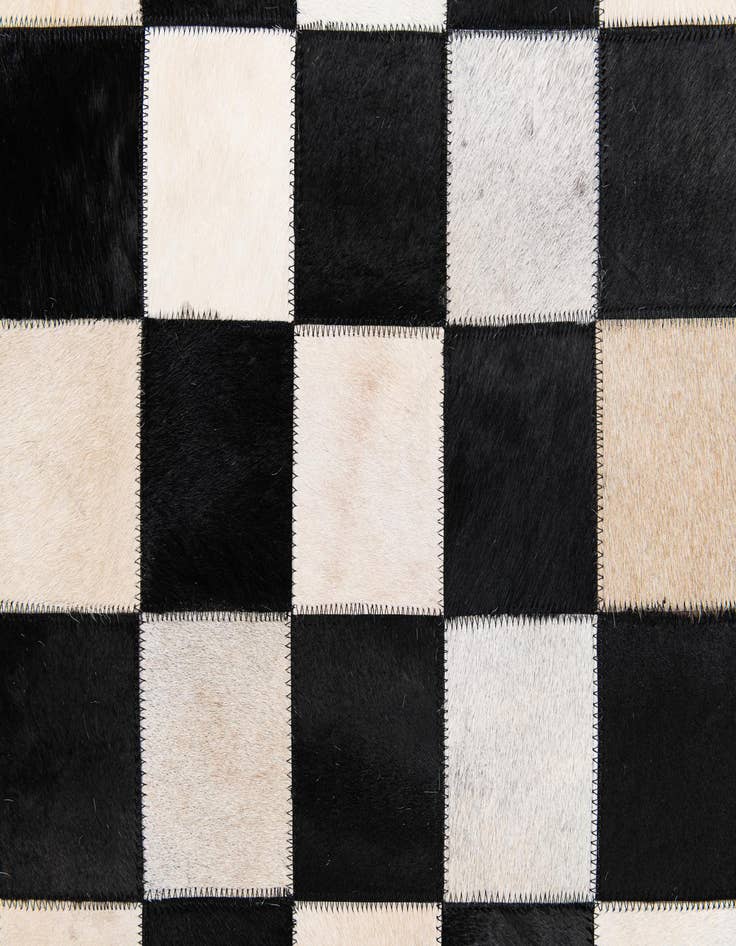 Detail image of  7' 11 x 9' 10 Cowhide Stocks Rug