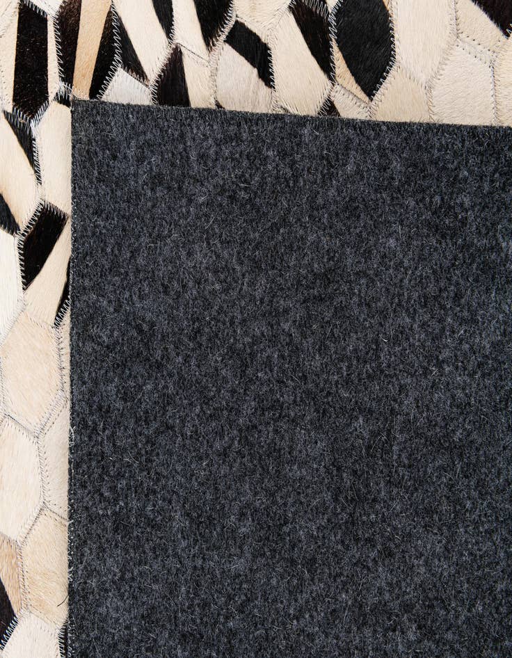 Detail image of  8' x 9' 9 Cowhide Stocks Rug