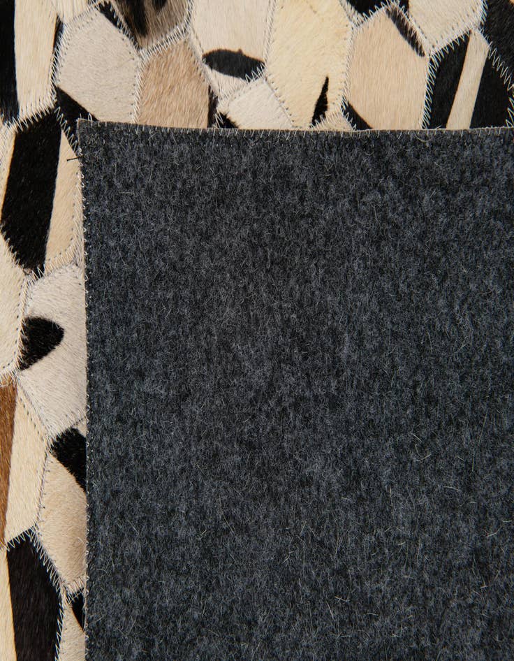 Detail image of  7' 11 x 9' 11 Cowhide Stocks Rug