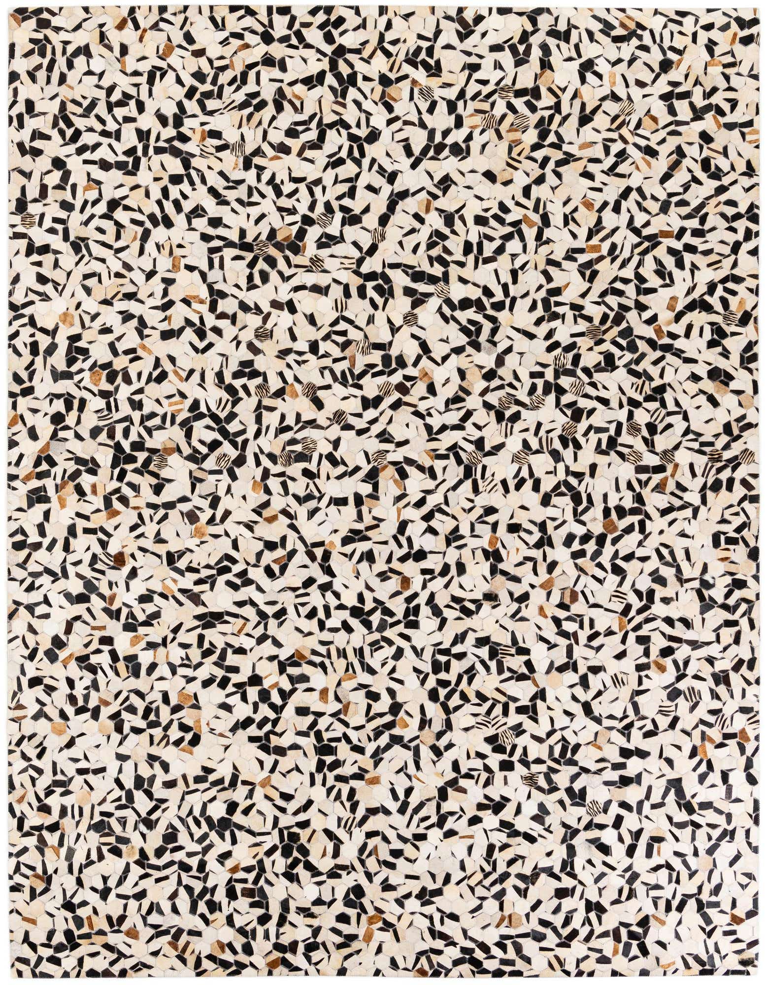 A rectangular 8x10 multi-colored modern rug made of cowhide and leather, featuring a mosaic of black, white, and brown irregular shapes.