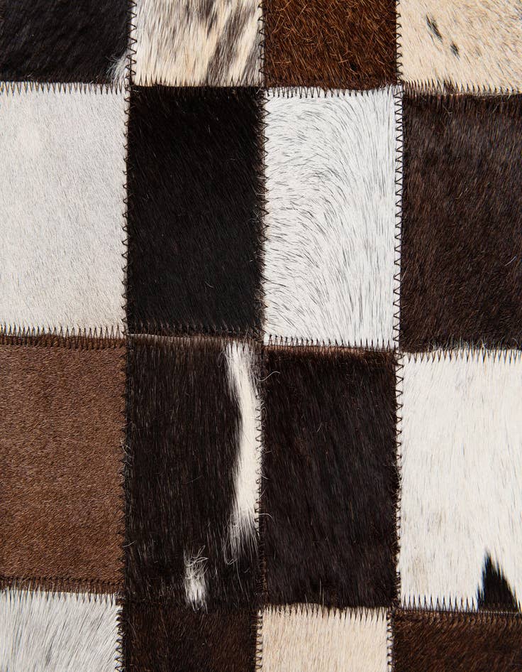 Detail image of  7' 11 x 9' 9 Cowhide Stocks Rug