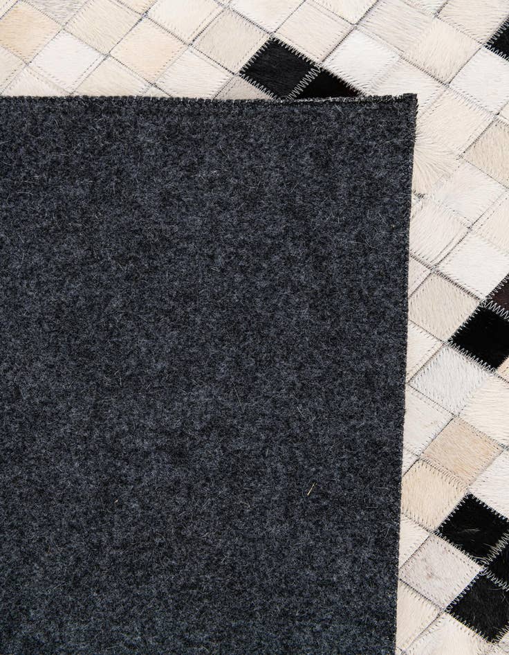 Detail image of  8' x 9' 11 Cowhide Stocks Rug