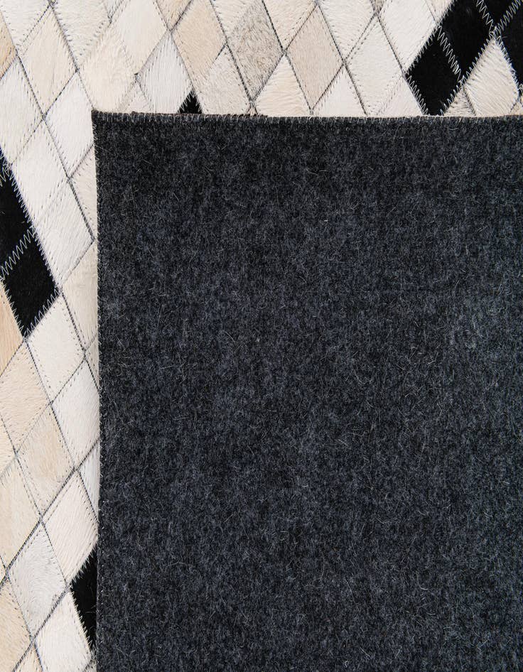 Detail image of  8' 1 x 9' 10 Cowhide Stocks Rug