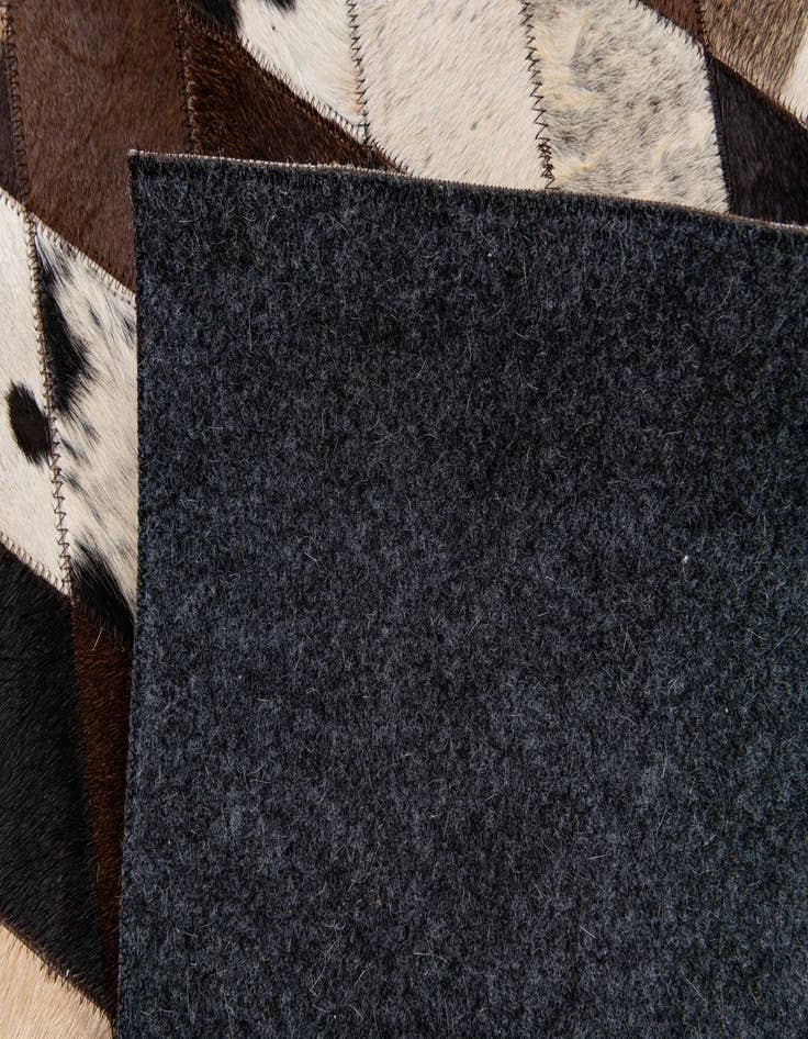 Detail image of  8' 1 x 10' 2 Cowhide Stocks Rug