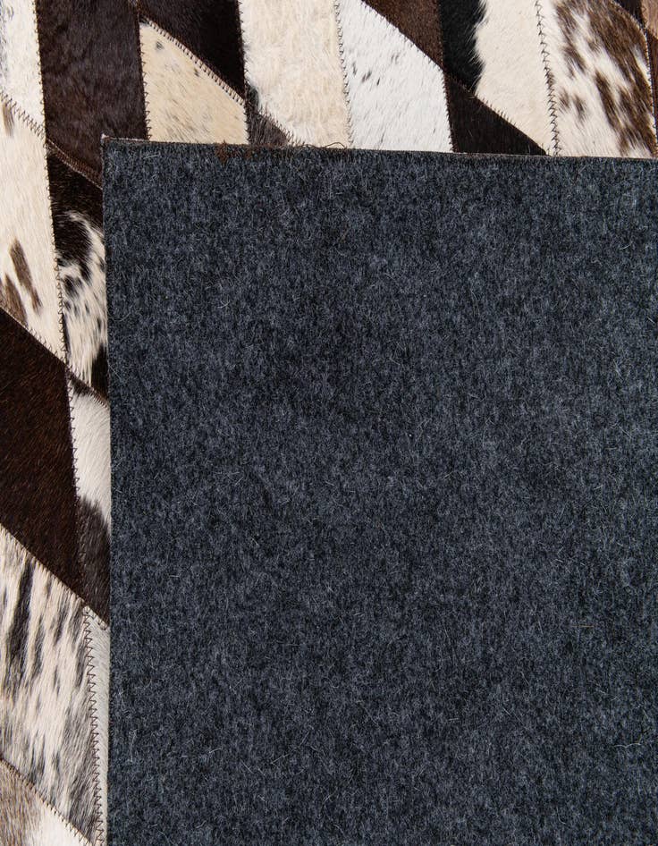 Detail image of  8' 1 x 10' 2 Cowhide Stocks Rug