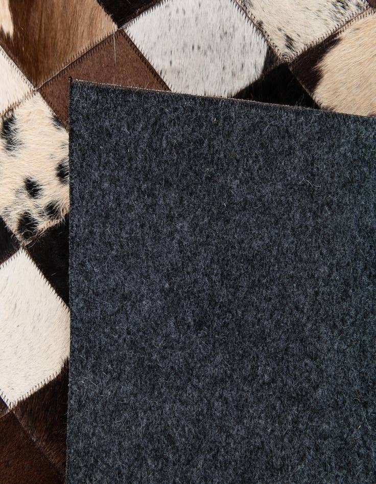 Detail image of  8' 1 x 10' 1 Cowhide Stocks Rug