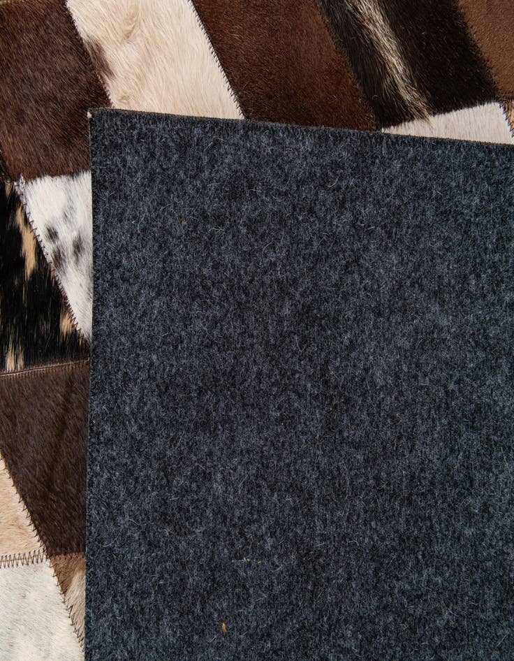 Detail image of  8' 2 x 10' 2 Cowhide Stocks Rug