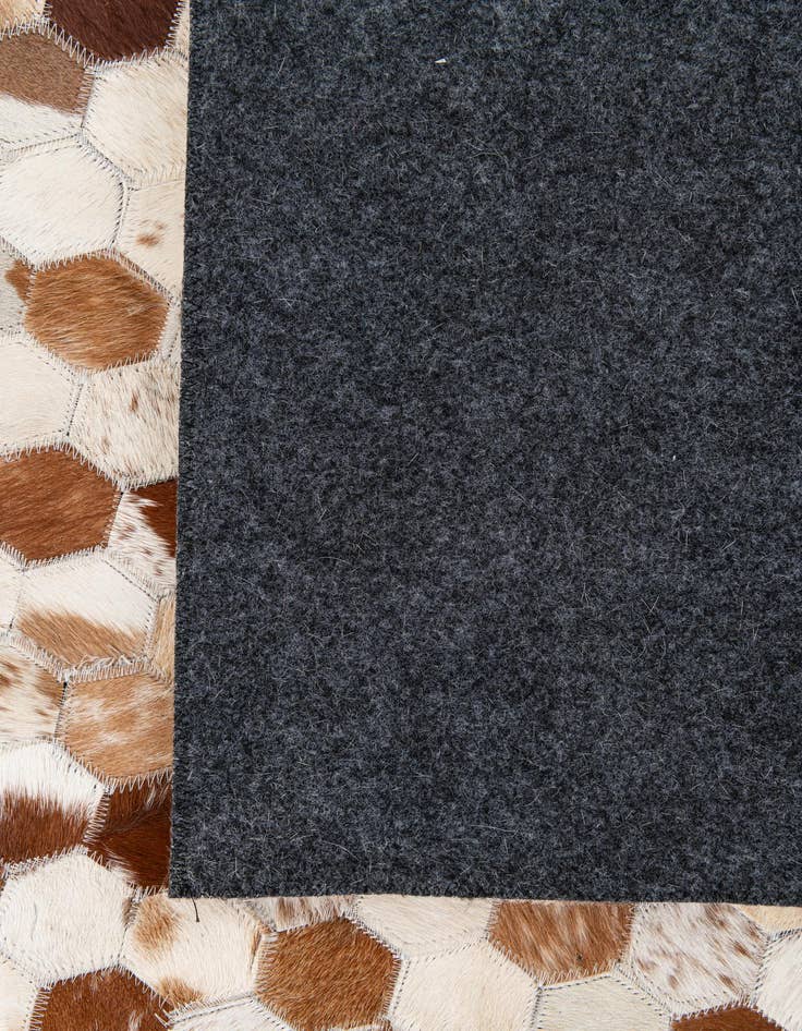 Detail image of  8' 1 x 9' 10 Cowhide Stocks Rug