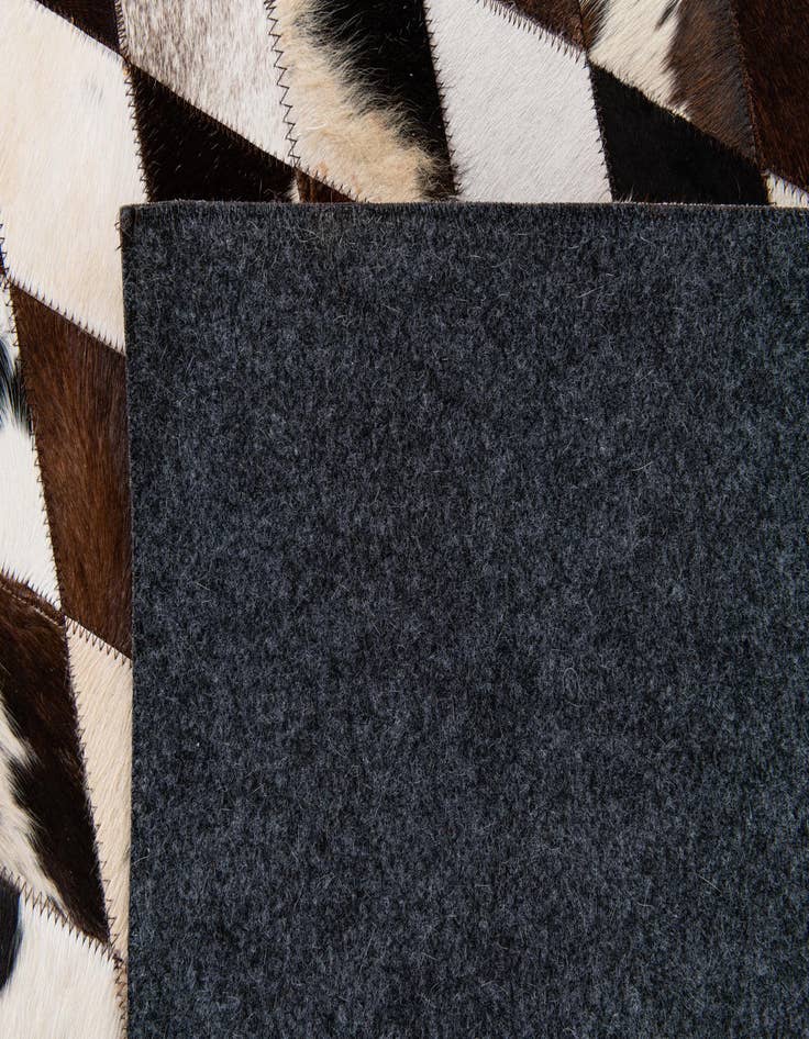 Detail image of  8' 1 x 10' 2 Cowhide Stocks Rug
