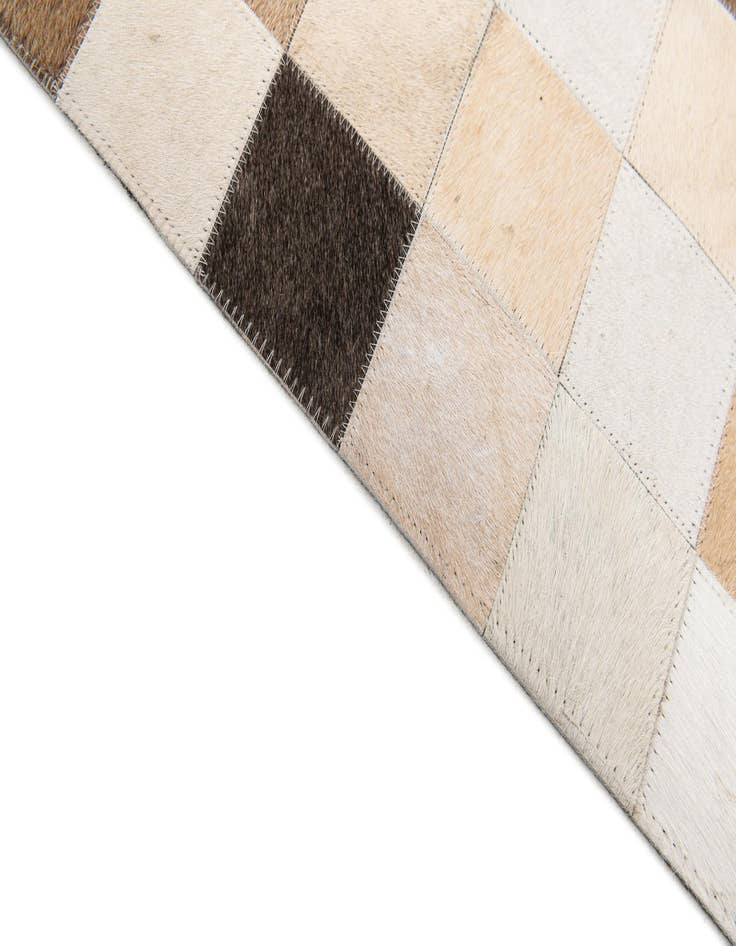 Detail image of  7' 11 x 9' 8 Cowhide Stocks Rug