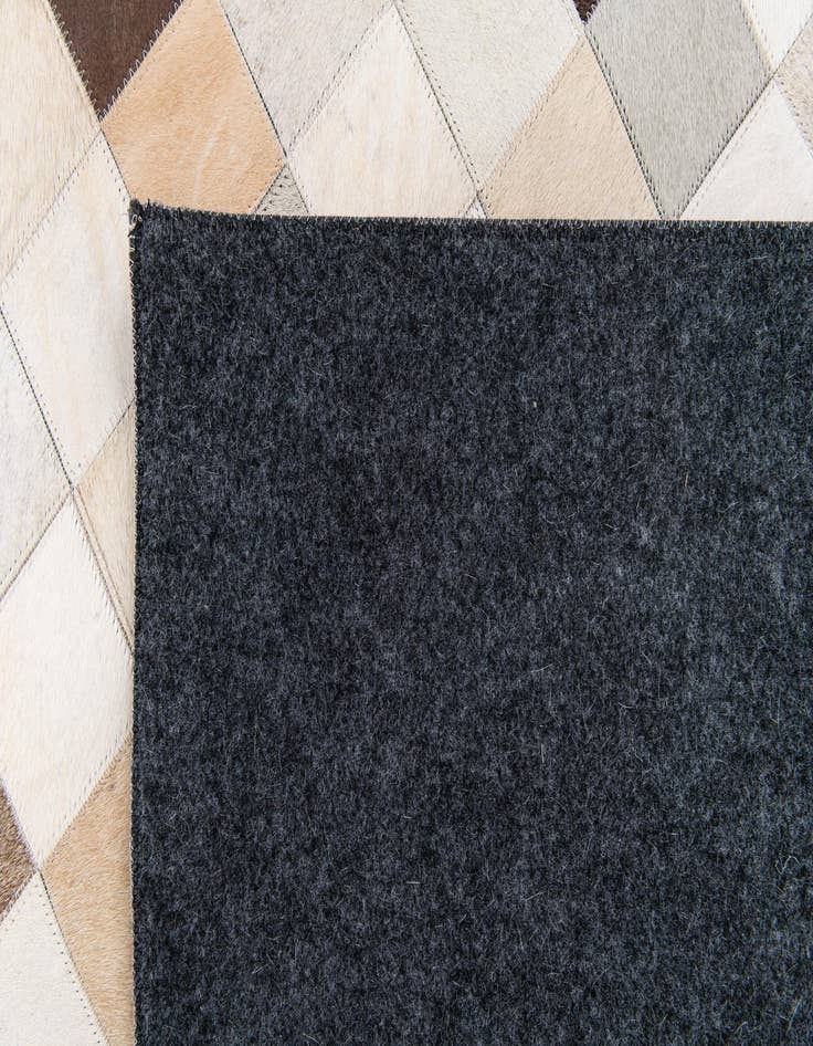 Detail image of  7' 11 x 9' 10 Cowhide Stocks Rug