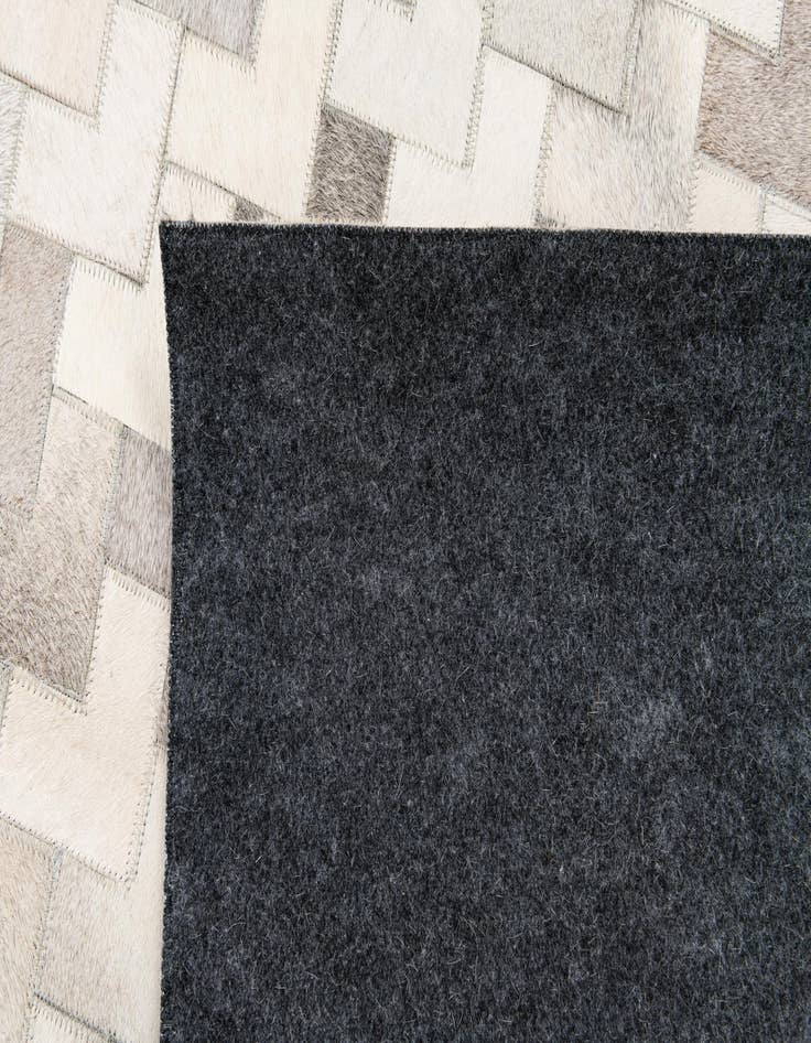 Detail image of  6' x 9' 1 Cowhide Stocks Rug