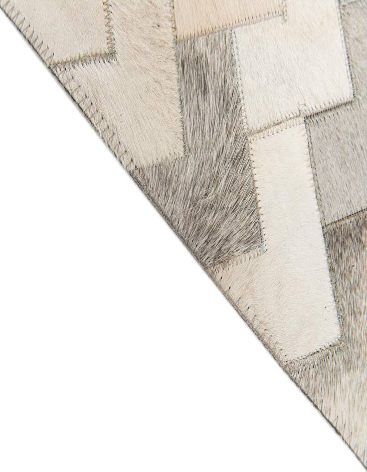 Detail image of  6' x 8' 11 Cowhide Stocks Rug
