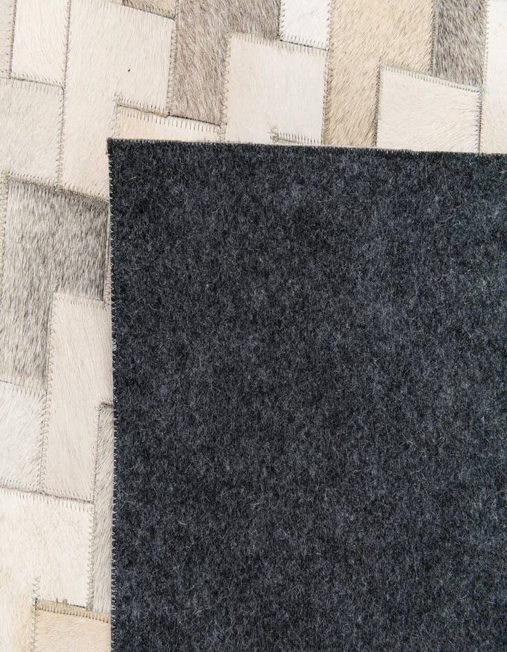 Detail image of  6' x 8' 11 Cowhide Stocks Rug
