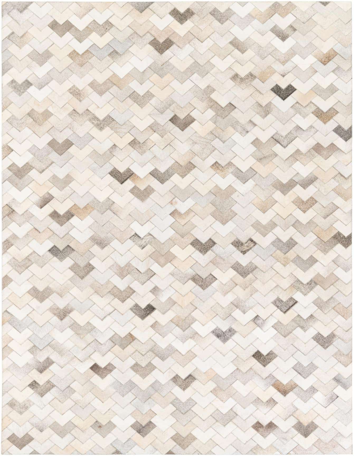A rectangular 6x9 Cowhide Stocks rug featuring a modern chevron pattern in various shades of multi-colored cowhide and leather.