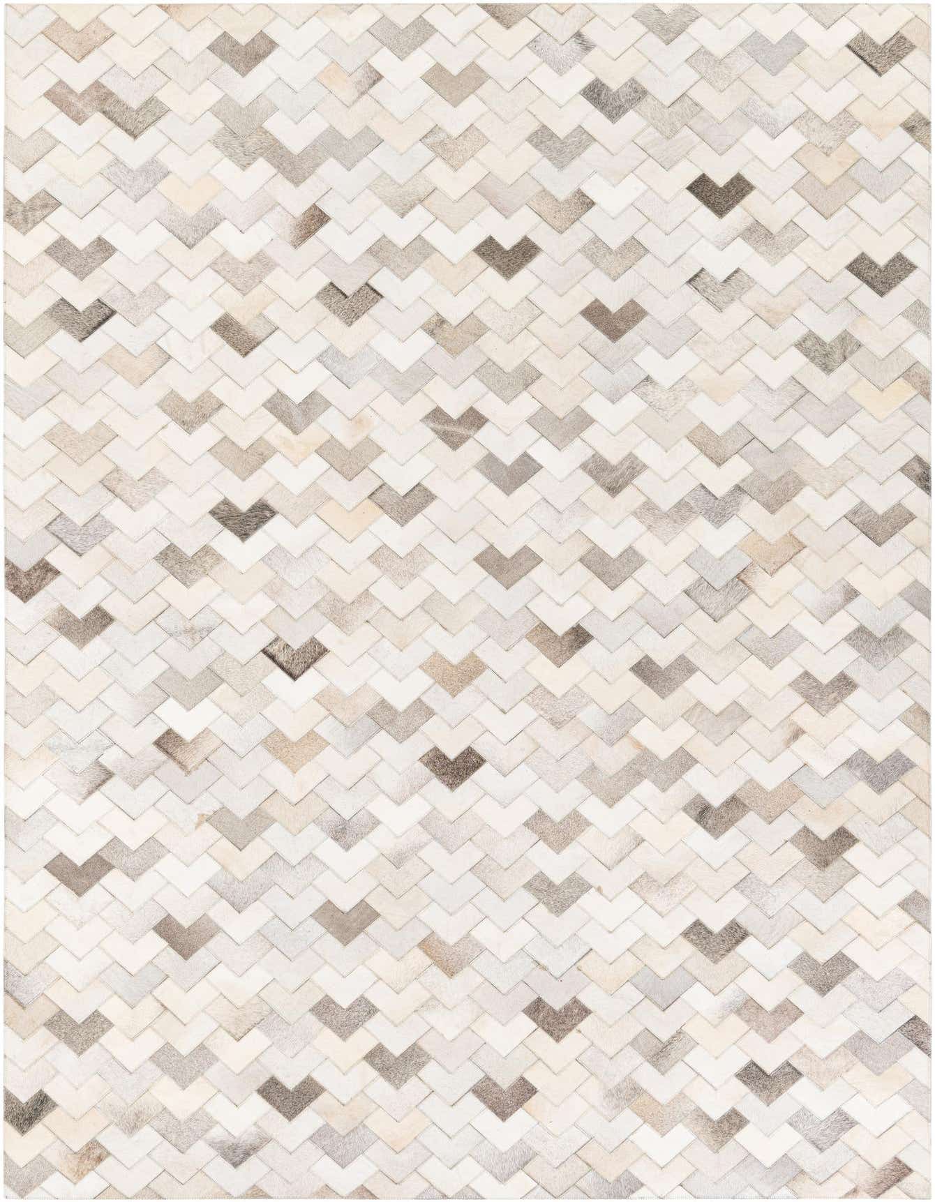 A 6x9 rectangular Cowhide Stocks rug featuring a modern chevron pattern in various shades of multi-colored cowhide and leather.
